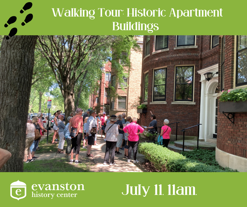 20 people on a neighborhood tour in front of a brink apartment building